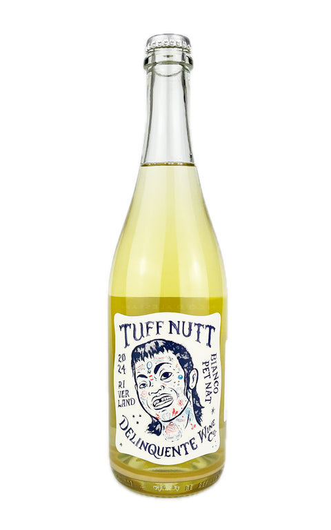 A bottle of Tuff Nutt Pet Nat wine with a label featuring a illustration of a person's face. Organic sparkling wine from Australia.